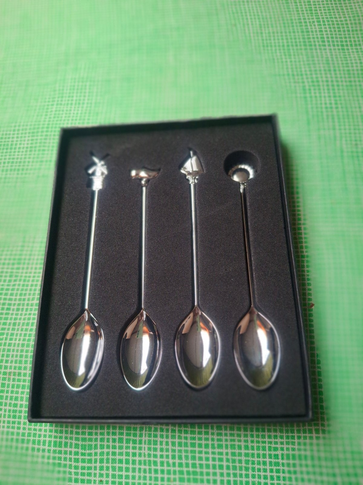 Set van 4 decoratieve lepeltjes met Hollandse thema's, Ophalen