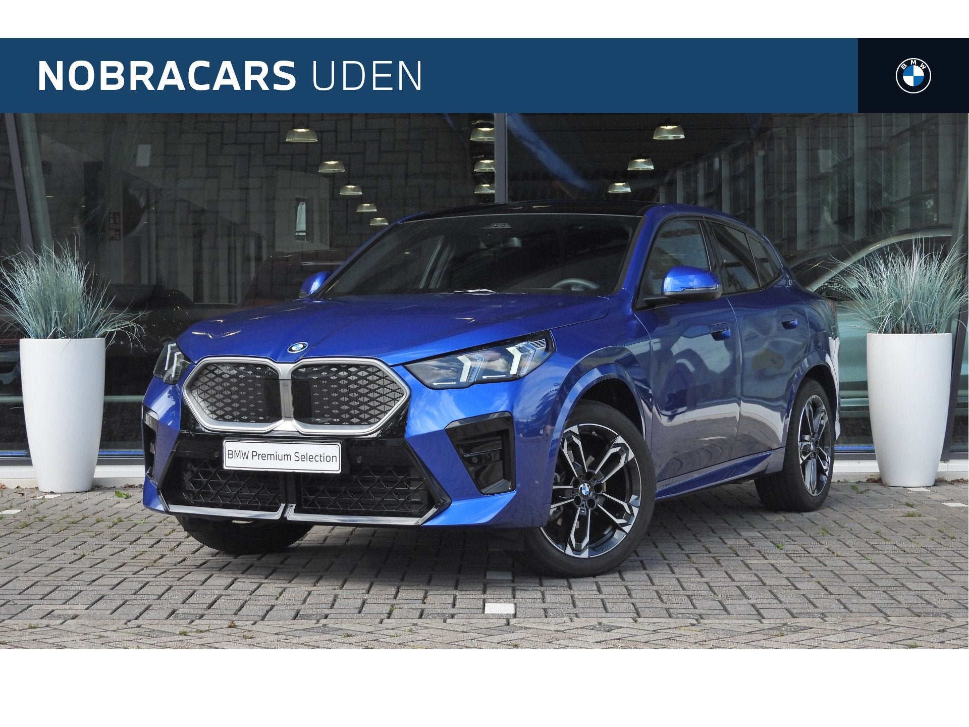 BMW iX2 eDrive20 M Sport / Panoramadak / Sportstoelen / Park, Auto's, BMW, Met garantie (alle), Origineel Nederlands, 204 pk, SUV of Terreinwagen