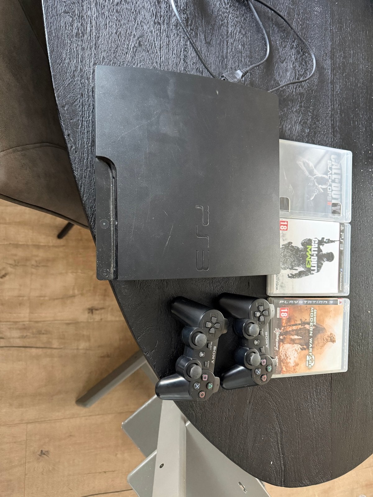 Playstation 3 met 2 controllers en 3 games, Met 2 controllers, Ophalen of Verzenden, 160 GB, Slim