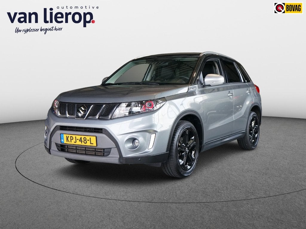 Suzuki Vitara 1.4 | NAVI|CAMERA|STOELVERW|1/2 LEDER|KEYLESS, Auto's, Suzuki, Gebruikt, Zwart, 4 cilinders, 1210 kg