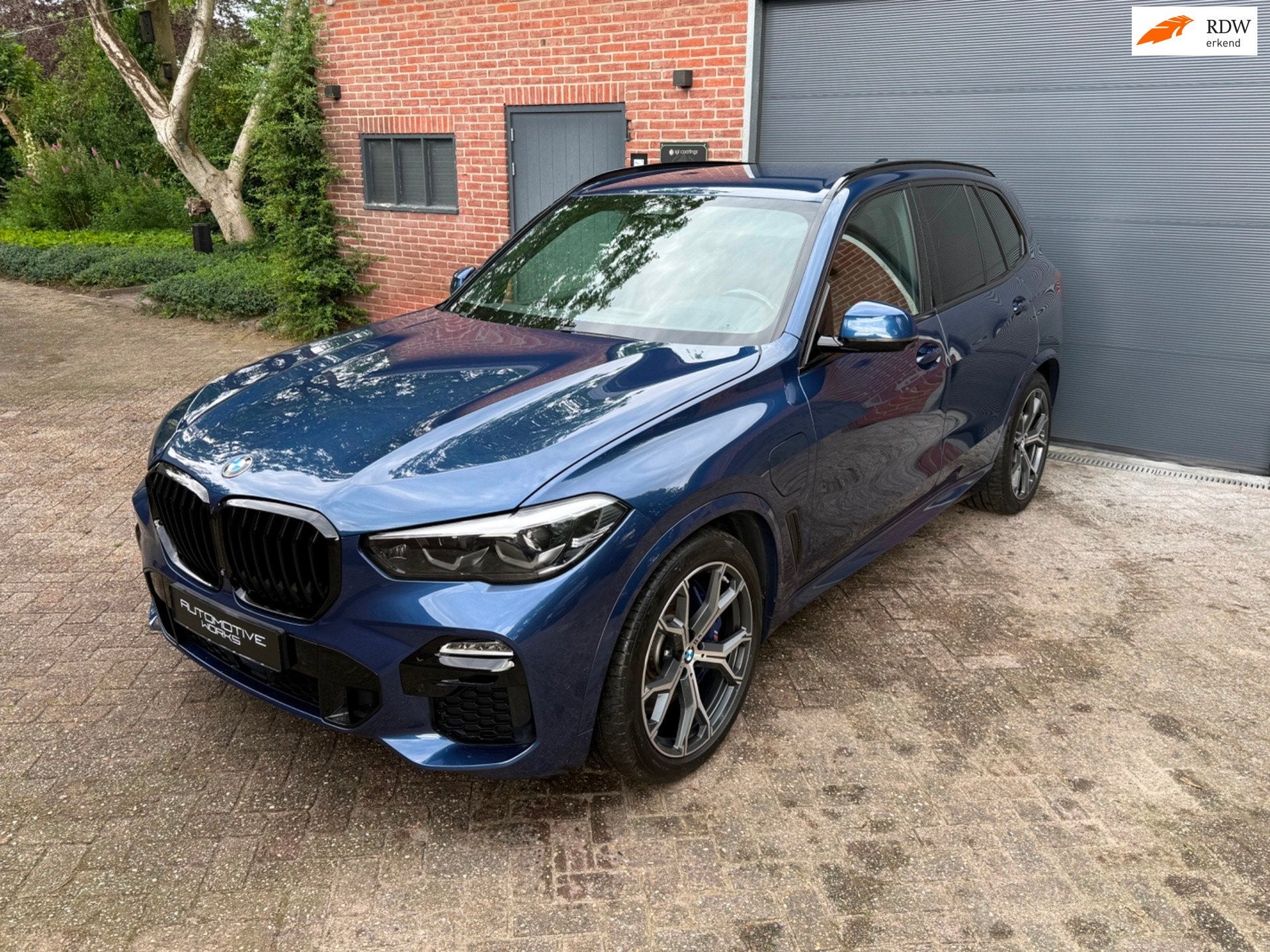 BMW X5 XDrive45e High Executive | Apple CarPlay l Harman & K, Auto's, Gebruikt, Blauw, Vierwielaandrijving, 2998 cc