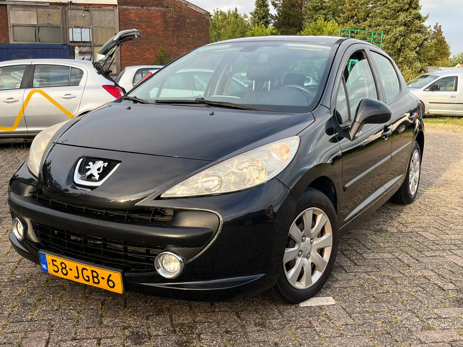 Peugeot 207 1.4 VTI 16V 5DRS 2009 Zwart / AIRCO / JVC / APK*, Auto's, Voorwielaandrijving, 1145 kg, Zwart, Origineel Nederlands