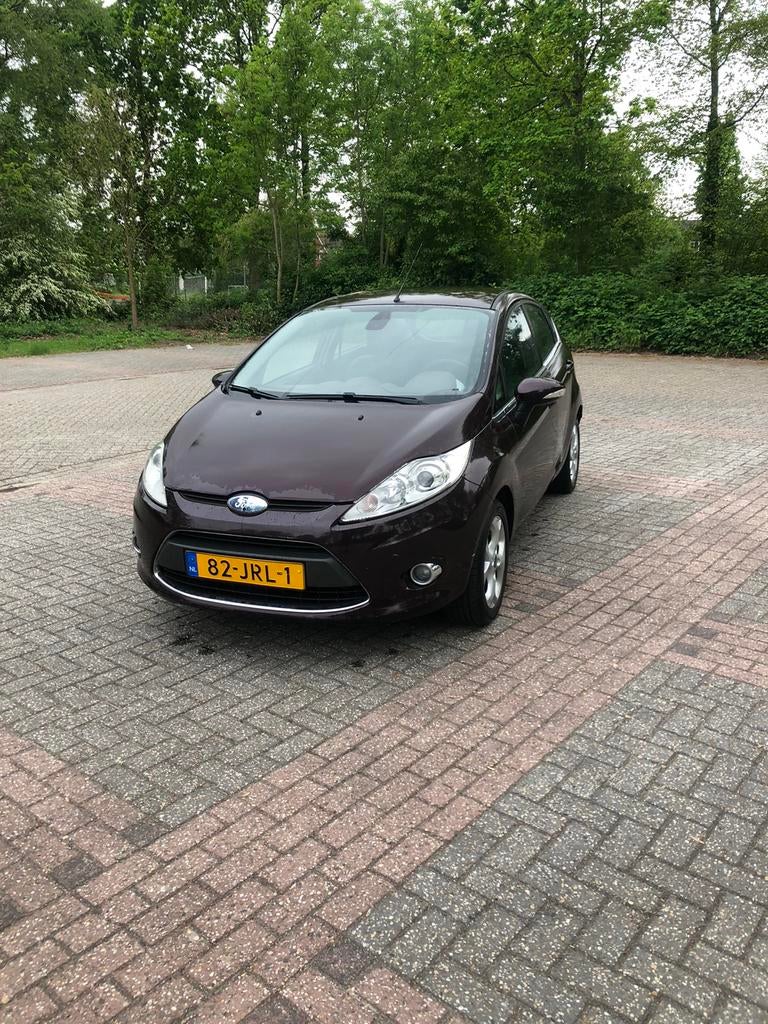 Ford Fiësta 1.25 60KW 5DR 2009 titanium, Voorwielaandrijving, 1242 cc, Origineel Nederlands, Bedrijf