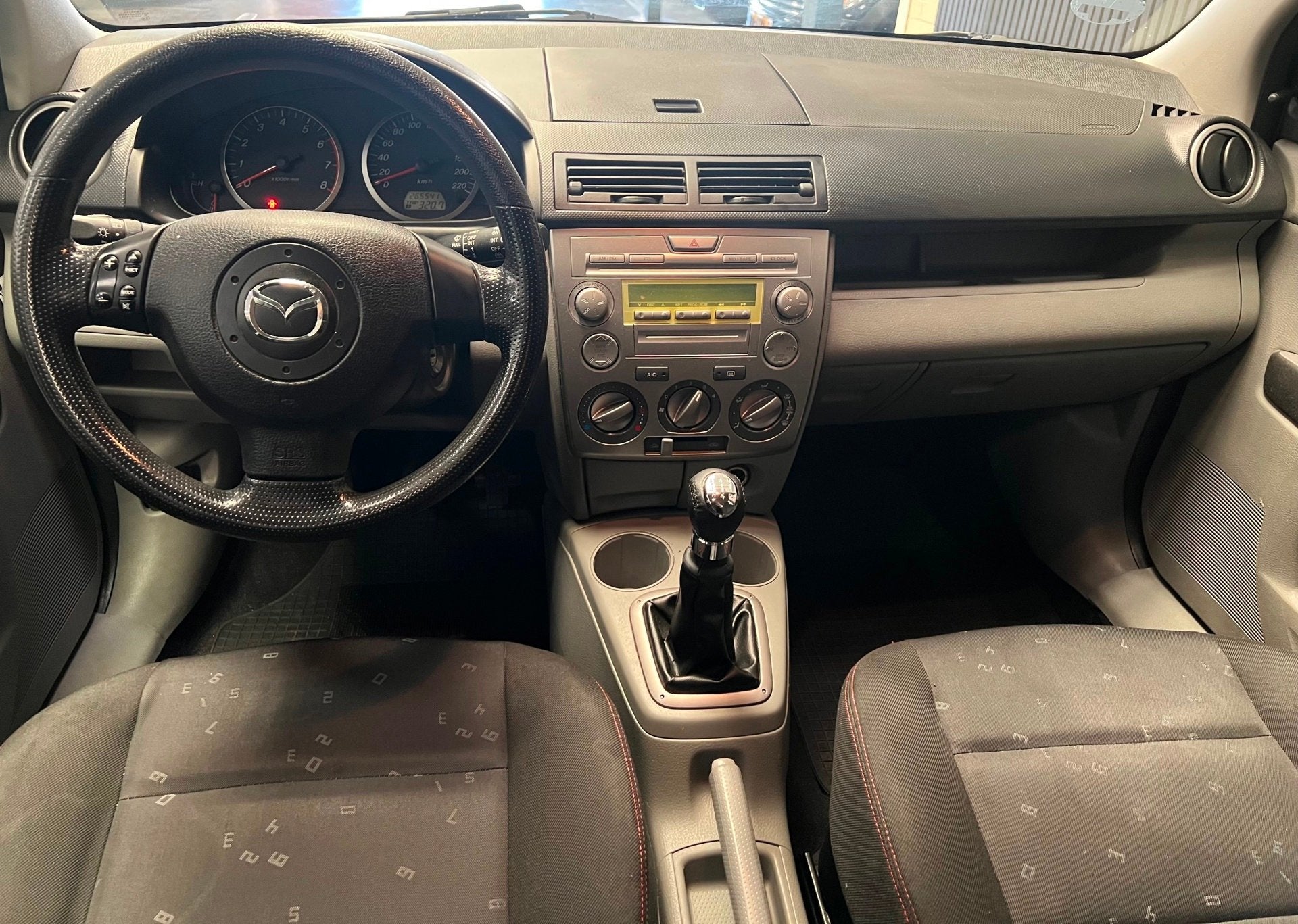 Mazda 2 1.4 Exclusive - 2e eigenaar – Airco – 4 nieuwe b, Zwart, Origineel Nederlands, Handgeschakeld, Euro 4