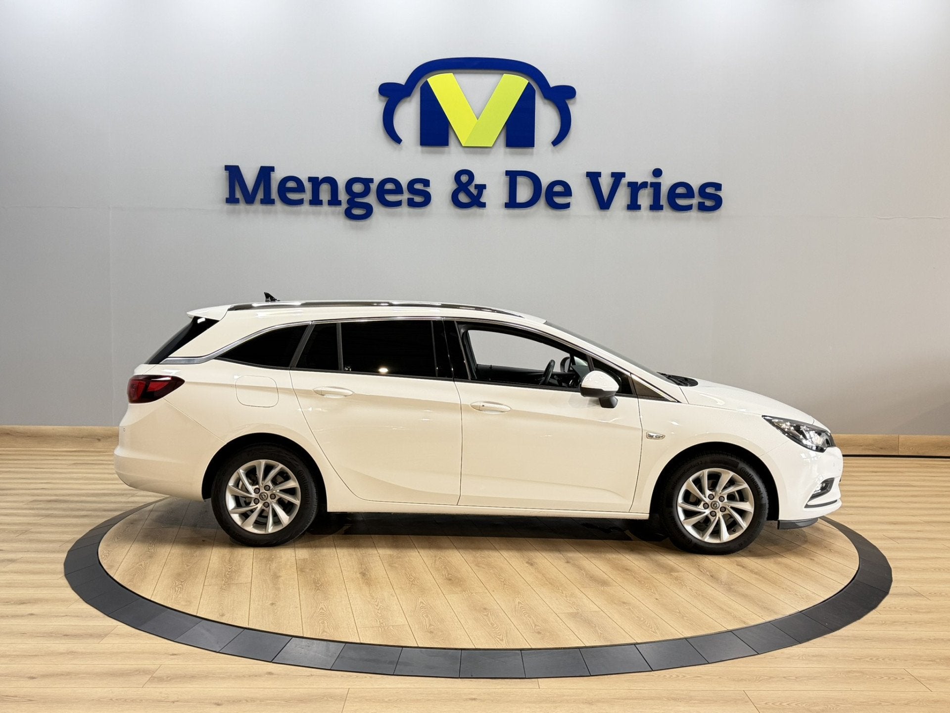 Opel Astra Sports Tourer 1.4 Turbo Innovation Airco ECC | Tr, 12 maanden, Gebruikt, Leder en Stof, Wit