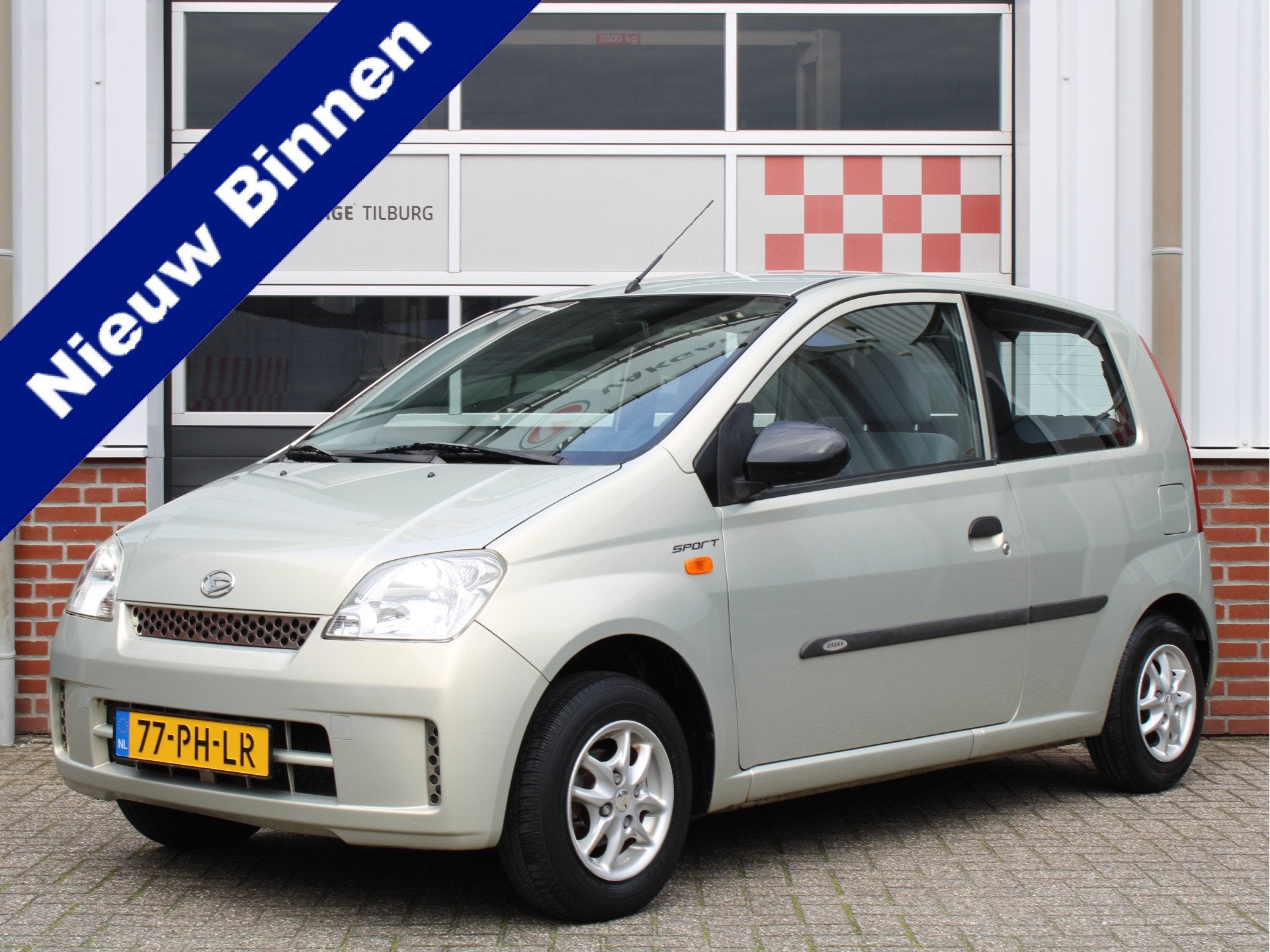 Daihatsu Cuore 1.0-12V Osaka Sport /Achterspoiler/12'LM/Radi, Auto's, Radio, 18 €/maand, Cuore, Beige