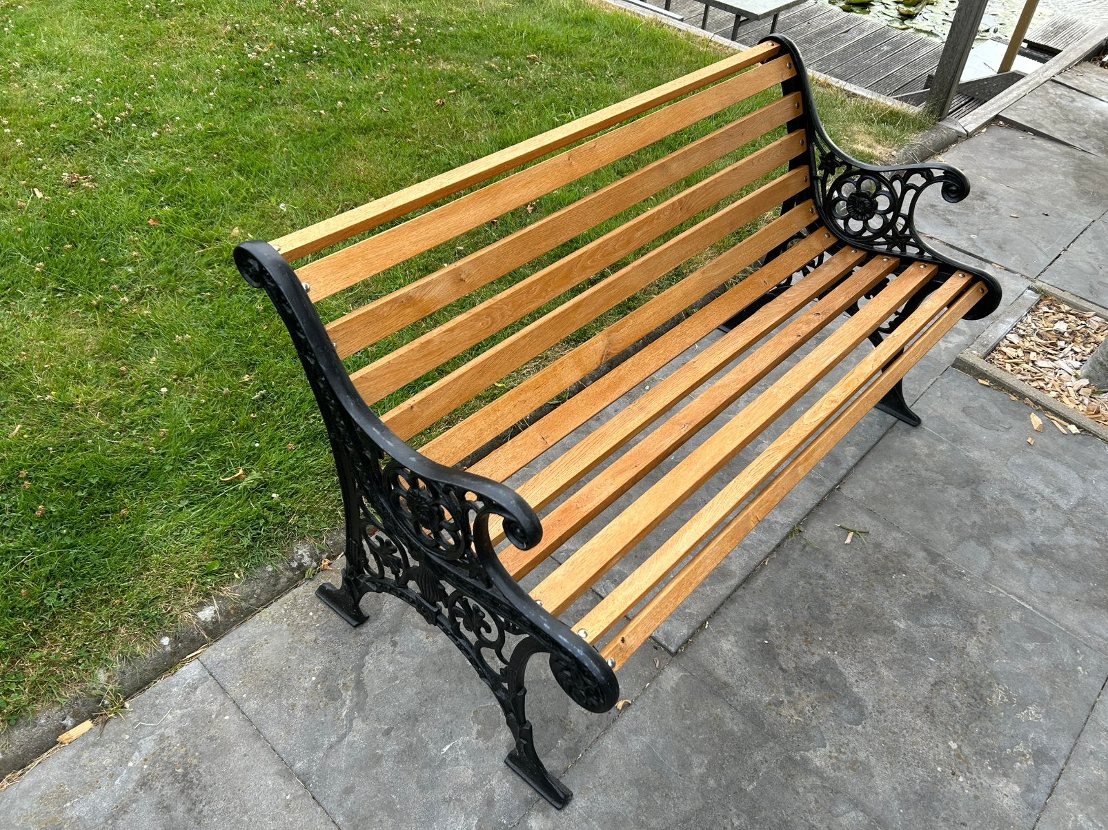 Tuinbank, hardhout en gietijzer 130cm breed, Tuin en Terras, Tuinbanken, Ophalen, Nieuw, Hout