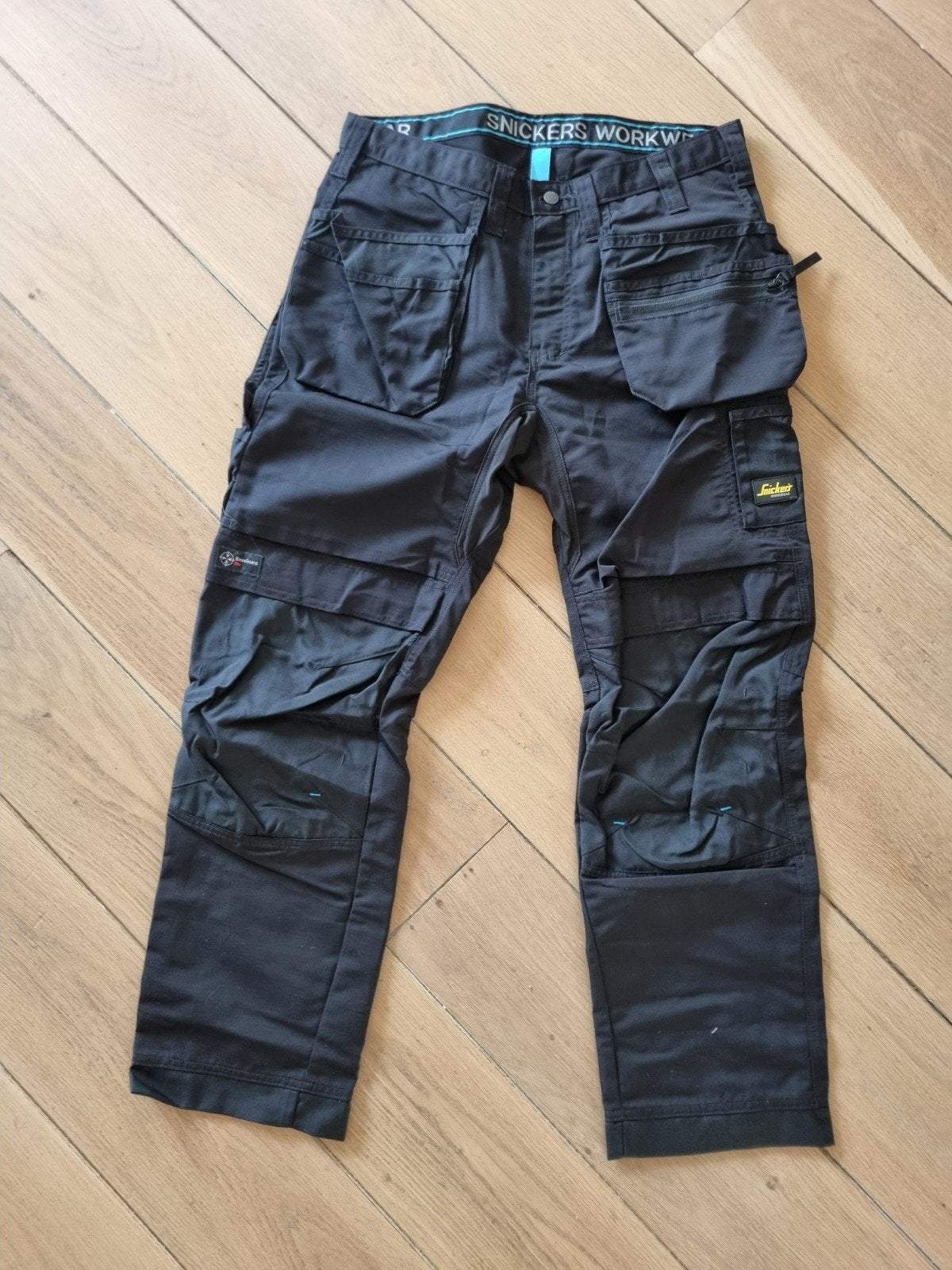 Snickers Workwear LiteWork Werkbroek Zwart Maat 52 Nieuw, Tuin en Terras, Werkkleding, Ophalen of Verzenden