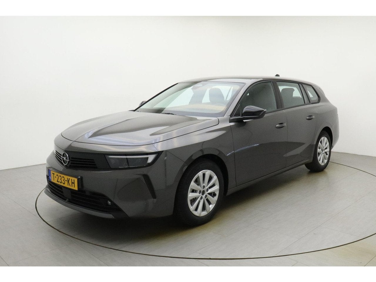 Opel Astra Sports Tourer 1.2 Turbo 110pk Edition | Navigatie, Auto's, Voorwielaandrijving, Gebruikt, 680 kg, 1199 cc