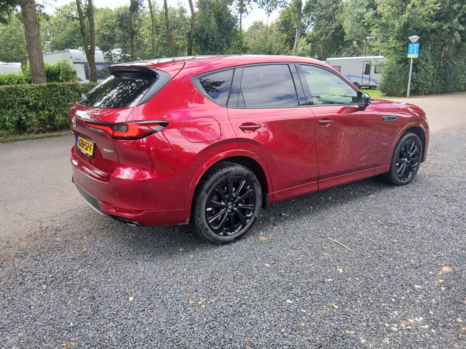 Mazda CX-60 2.5 E-skyactiv Homura Phev 327pk Aut 2023 Rood, Auto's, Mazda, Automaat, Zwart, 327 pk, 2500 kg