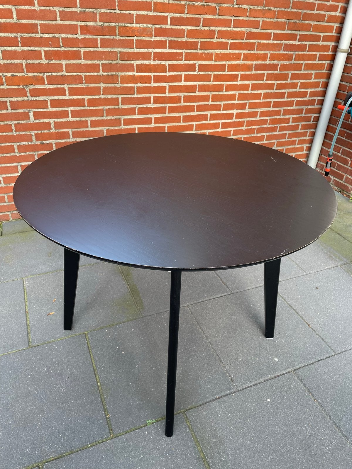 Ronde eettafel zwart met lichte schaafplekjes, Ophalen, Gebruikt, 100 tot 150 cm, Rond