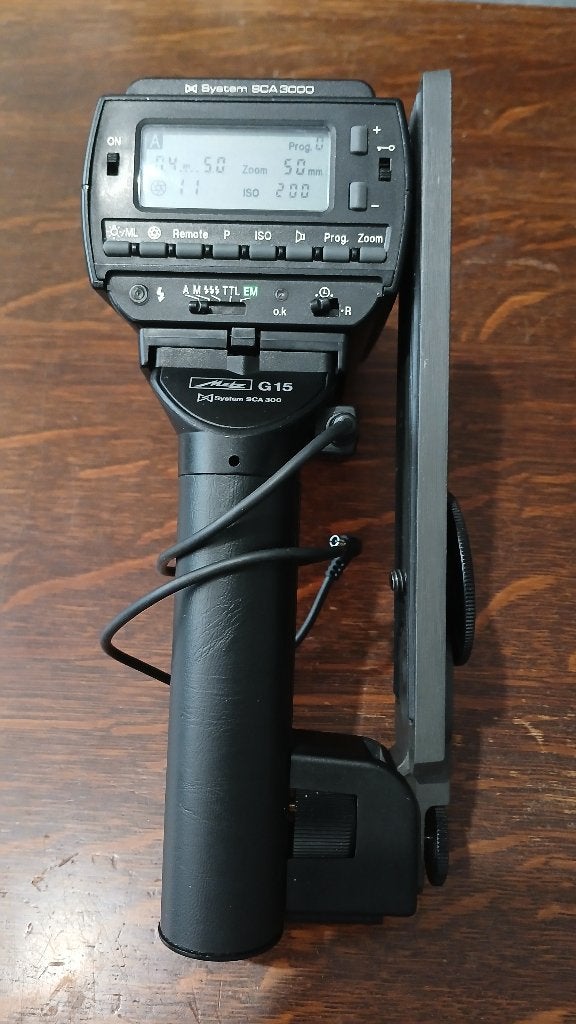 Metz mecablitz 40MZ-3 met G15 grip, Gebruikt, Ophalen of Verzenden, Voor analoge fotografie, Staafflitser