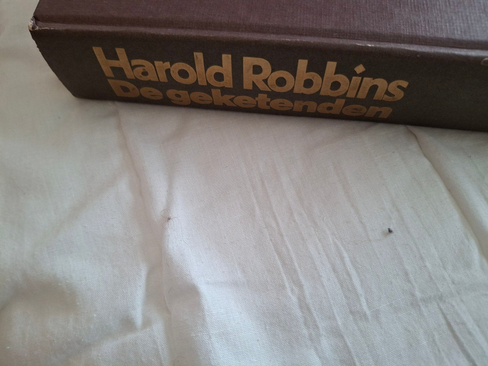 Harold Robbins - De geketenden (MCMLXXX), Ophalen of Verzenden, Zo goed als nieuw, Harold Robbins