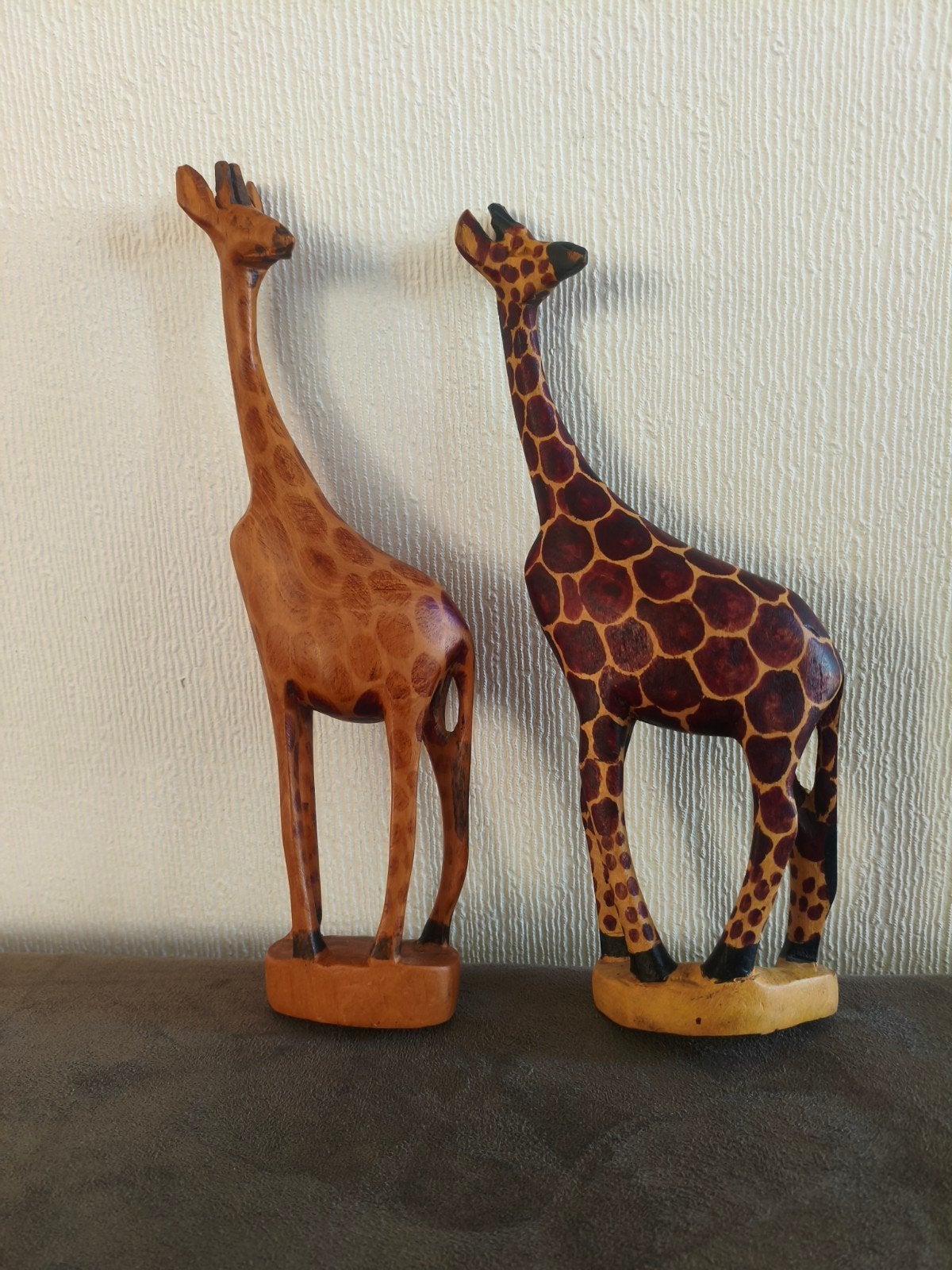Set van 2 houten giraffen - handgesneden decoratie, Hout, Gebruikt, Ophalen of Verzenden, Oosters