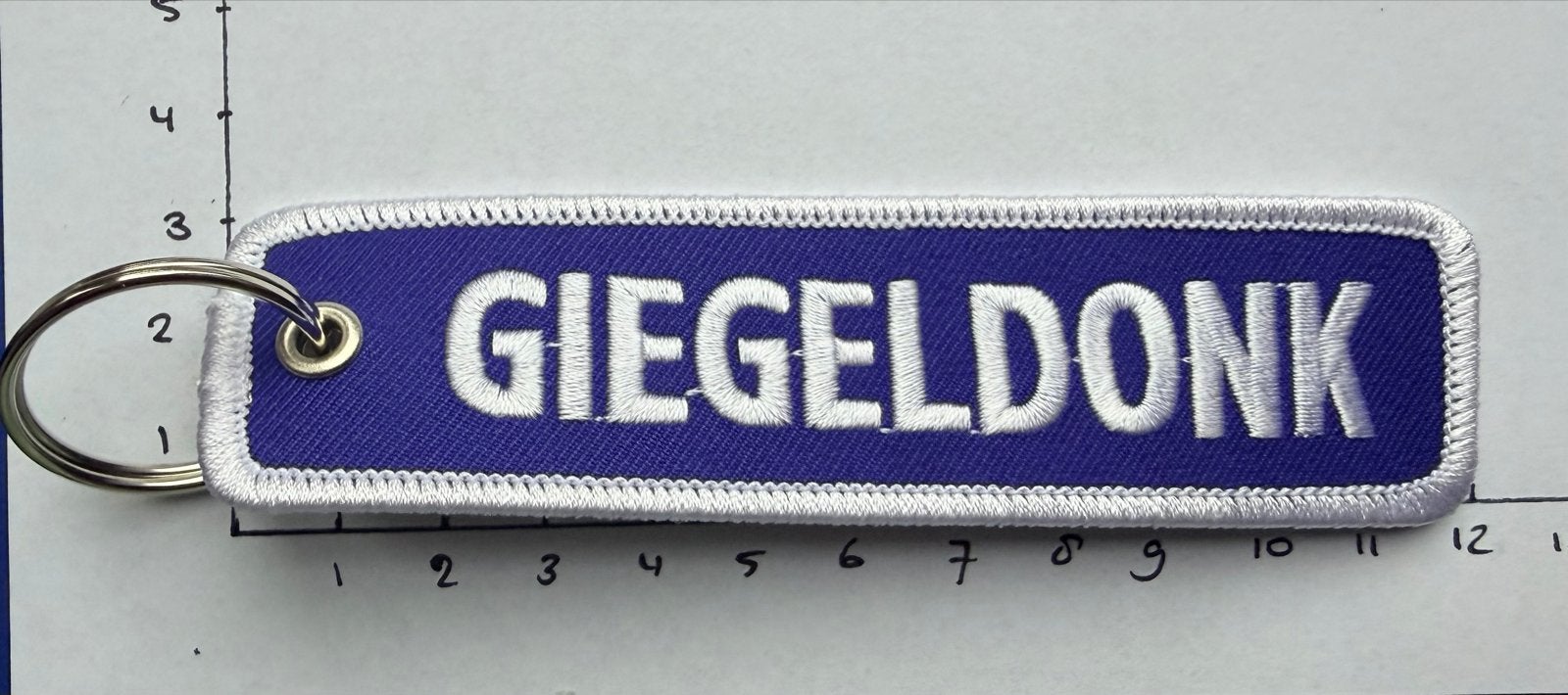 Geborduurde Sleutelhanger 'GIEGELDONK', Ophalen of Verzenden, Nieuw, Overige typen