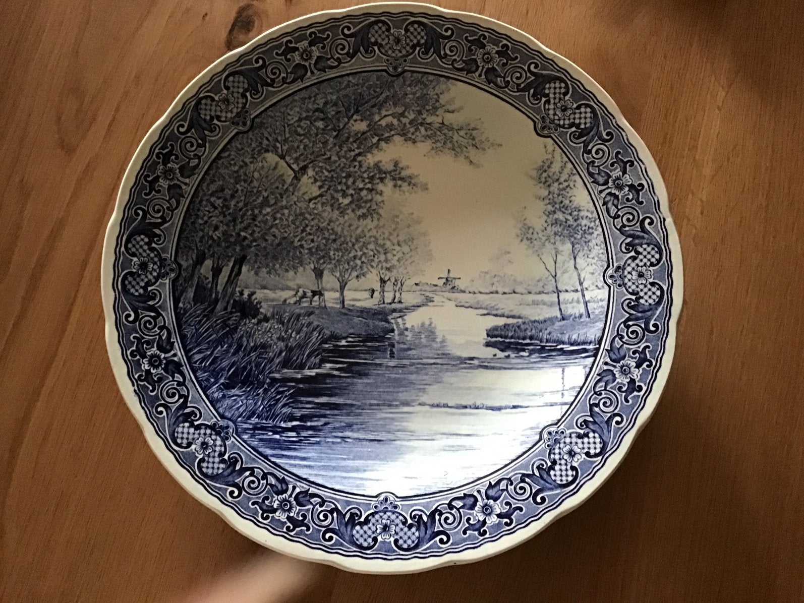 Delfts blauw wandbord (doorsnede 31 cm), Ophalen