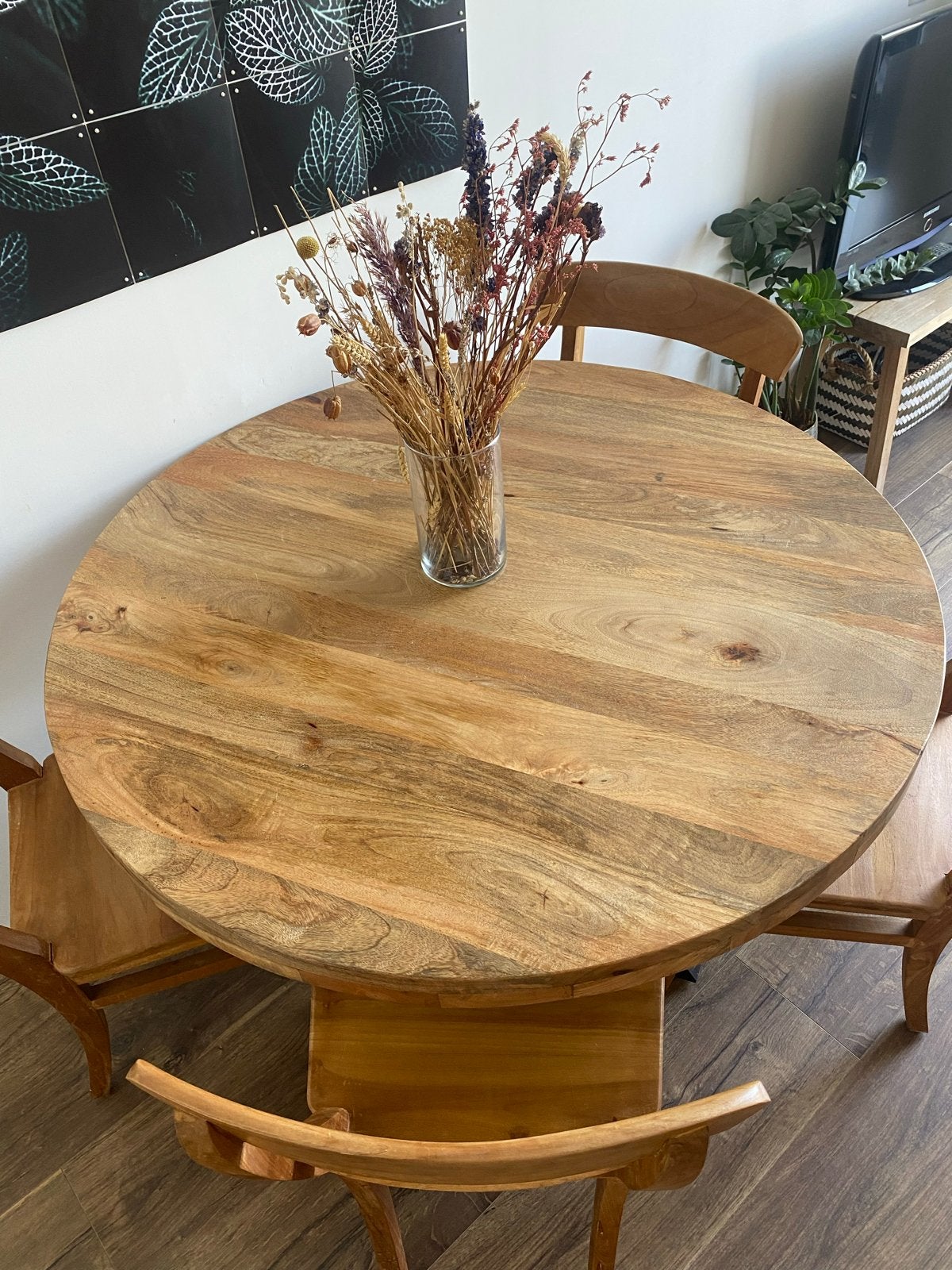 Ronde eettafel van mangohout met zwart metalen onderstel, Ophalen, 100 tot 150 cm, Rond, Zo goed als nieuw