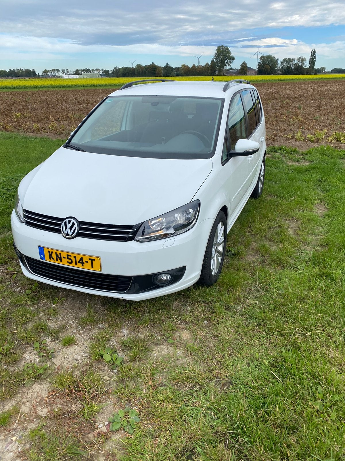 Volkswagen Touran 1.6 TDI 77KW Cross 2014 Wit, Auto's, Voorwielaandrijving, 4 cilinders, Wit, 22 km/l