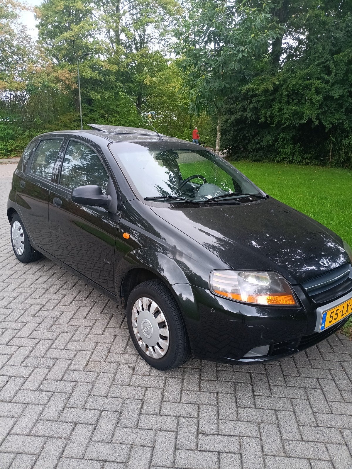 Daewoo Kalos 1.4 2003 Zwart, Auto's, 40 €/maand, 4 cilinders, Kalos, Zwart
