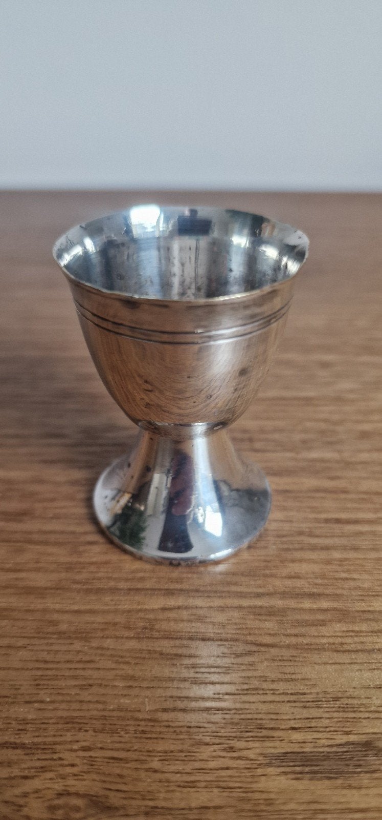Verzilverde eierdop van Sola, Ophalen