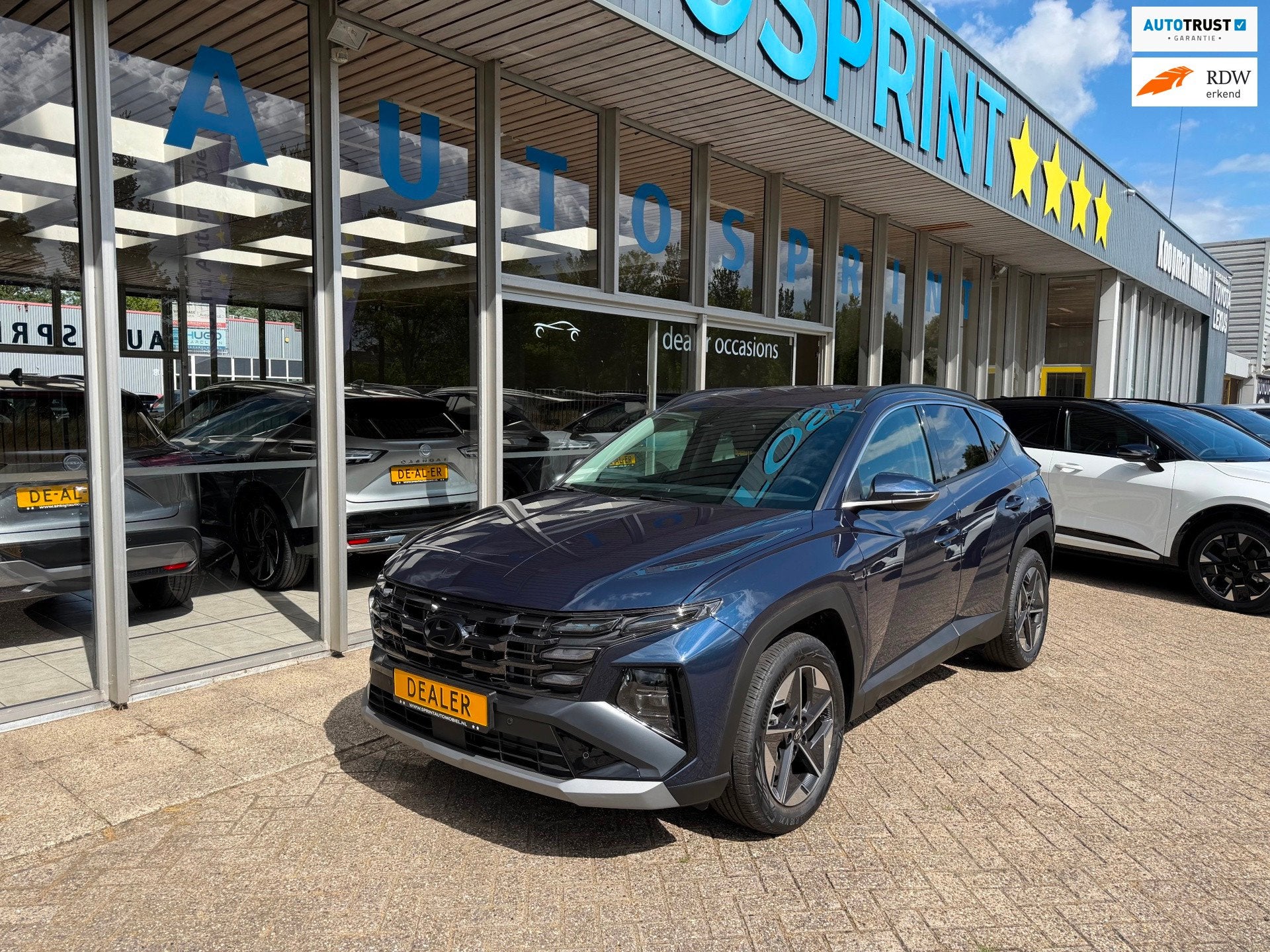Hyundai Tucson 1.6 T-GDI MHEV Comfort 161PK , NAVIGATIE , CA, Auto's, Stof, Gebruikt, Zwart, 4 cilinders