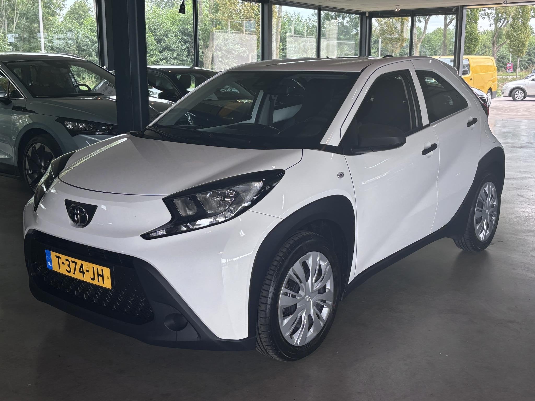 Toyota Aygo X 1.0 VVT-i MT, Auto's, Stof, Gebruikt, 4 stoelen, Wit