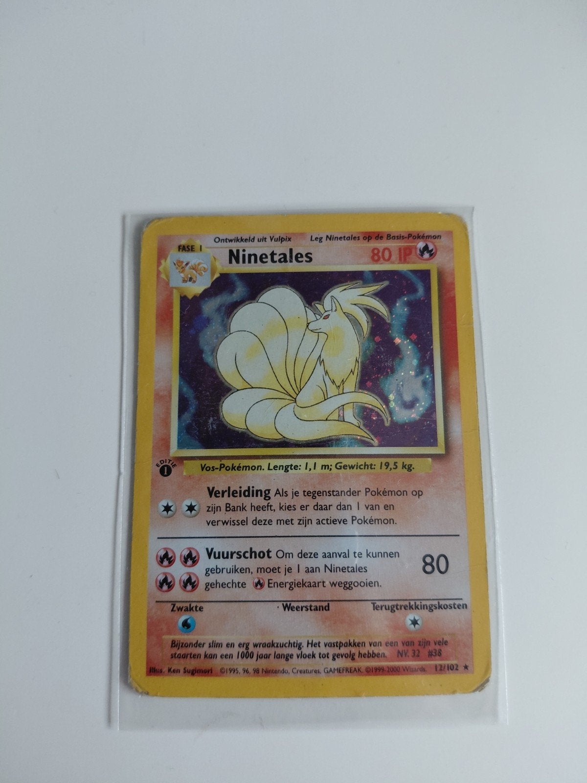 Ninetales base holo 1e editie, Hobby en Vrije tijd, Verzamelkaartspellen | Pokémon, Ophalen of Verzenden, Zo goed als nieuw