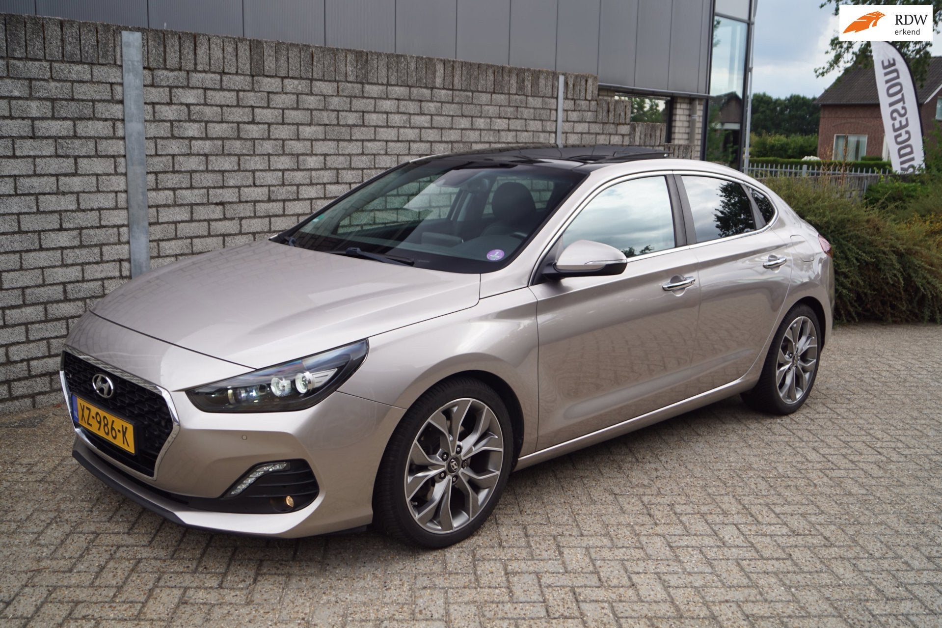Hyundai I30 Fastback 1.4 T-GDI Premium Autom Panodak Leder S, Auto's, 4 cilinders, Leder, Bedrijf, I30