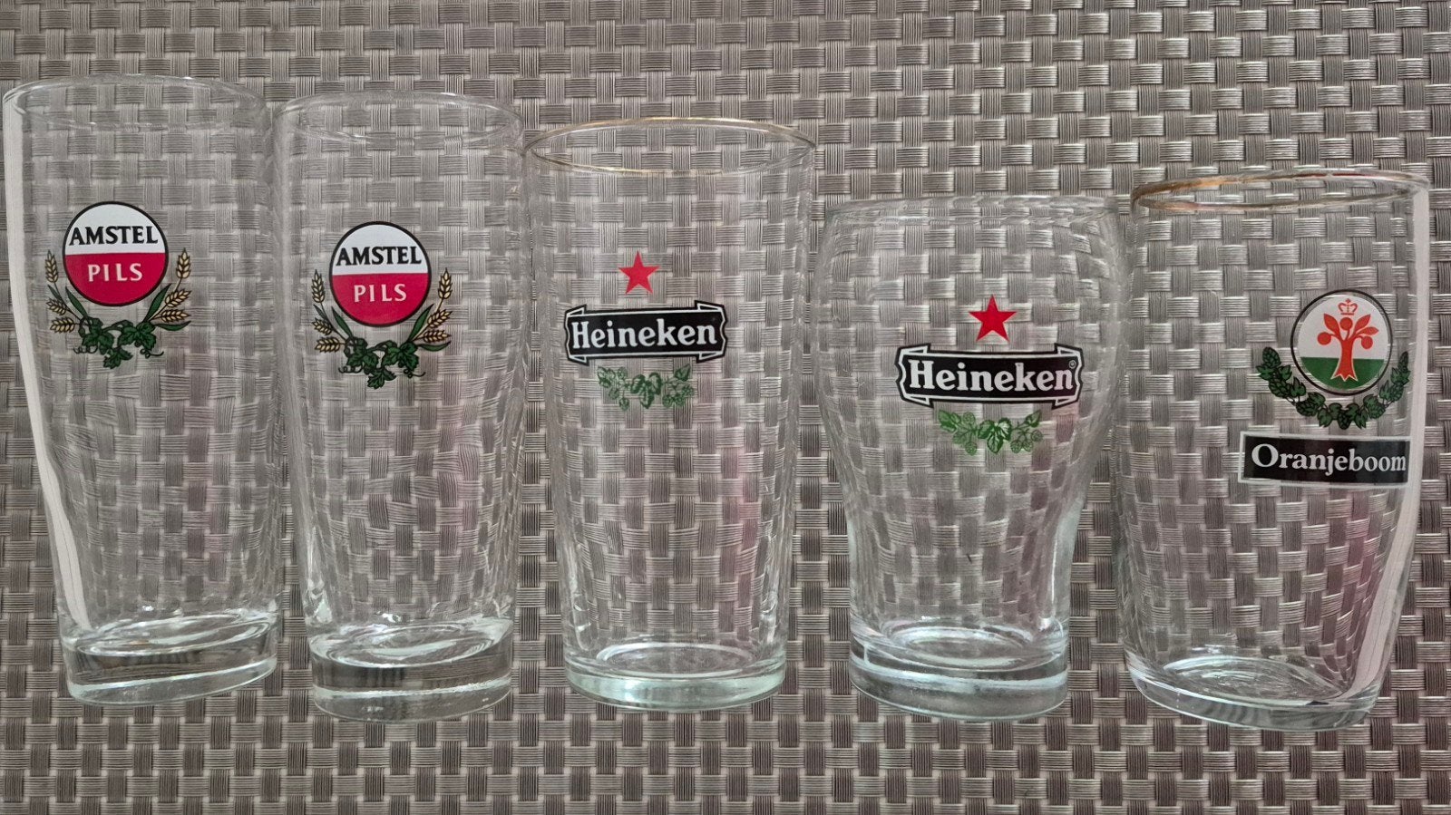 5 bierglazen: 2x Heineken, 2x Amstel pils en 1x Oranjeboom, Verzamelen, Ophalen of Verzenden, Zo goed als nieuw, Glas of Glazen