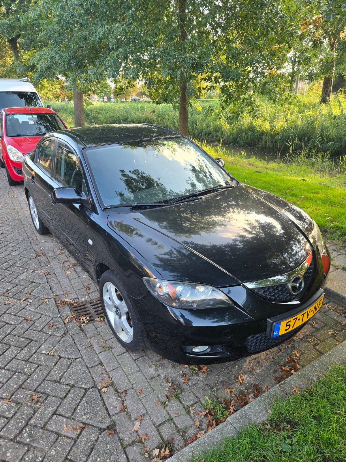 Mazda 3 2.0 Sedan 2007 Zwart, Auto's, 4 cilinders, Zwart, Origineel Nederlands, Handgeschakeld