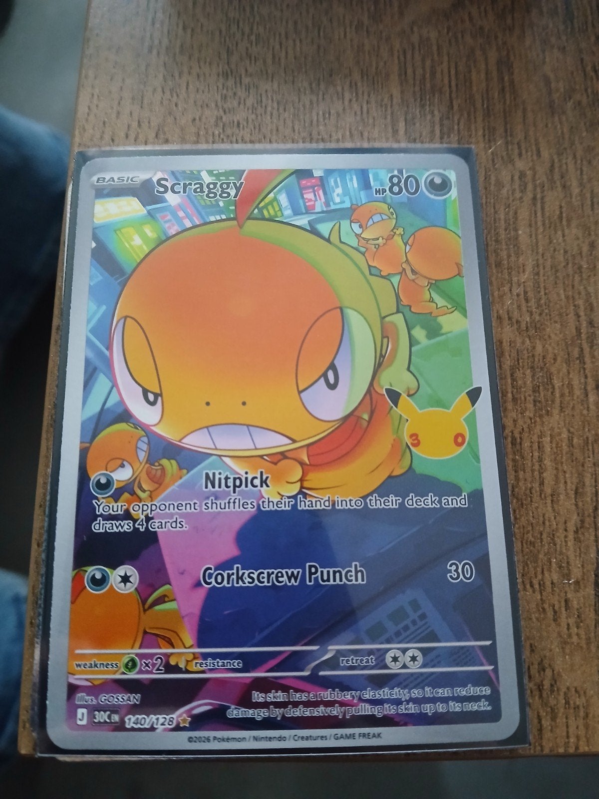 Pokémon Kaart Scraggy 140/128 Celebrations, Ophalen of Verzenden, Zo goed als nieuw, Losse kaart
