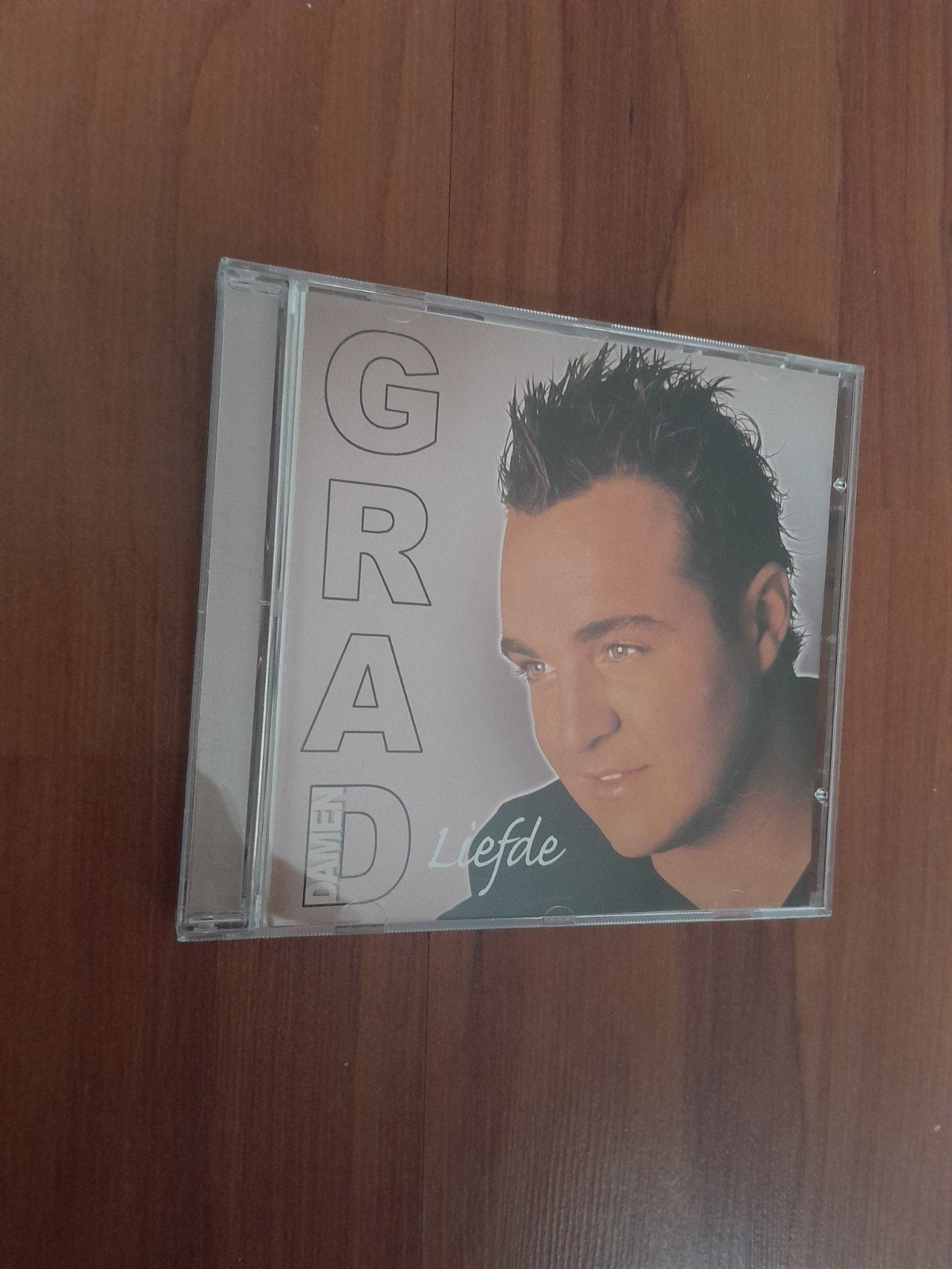 Grad Damen Liefde, Ophalen of Verzenden, Zo goed als nieuw, Levenslied of Smartlap