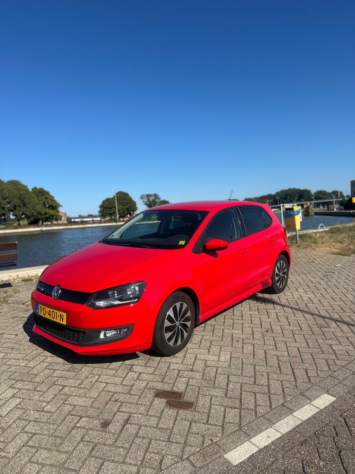 Volkswagen Polo 1.0 TSI 95PK 5D Bluemotion 2017 Rood, Dealer onderhouden, Stof, 40 €/maand, 95 pk