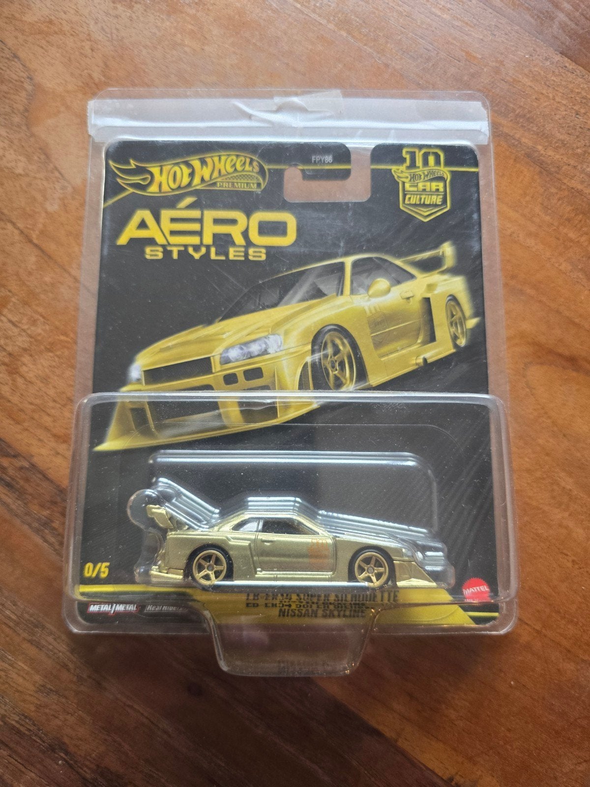 Hot Wheels Premium Aero Styles Nissan Skyline GTR R34 Goud, Hobby en Vrije tijd, Ophalen of Verzenden