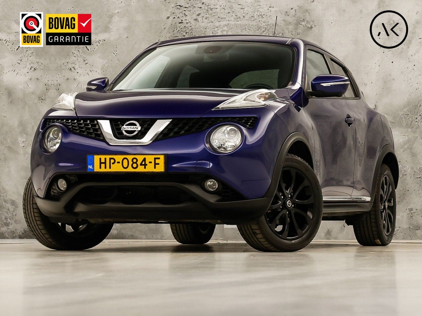 Nissan Juke 1.6 Sport Automaat (NAVIGATIE, CLIMATE, 360 CAME, Zwart, Blauw, Alcantara, 49 €/maand