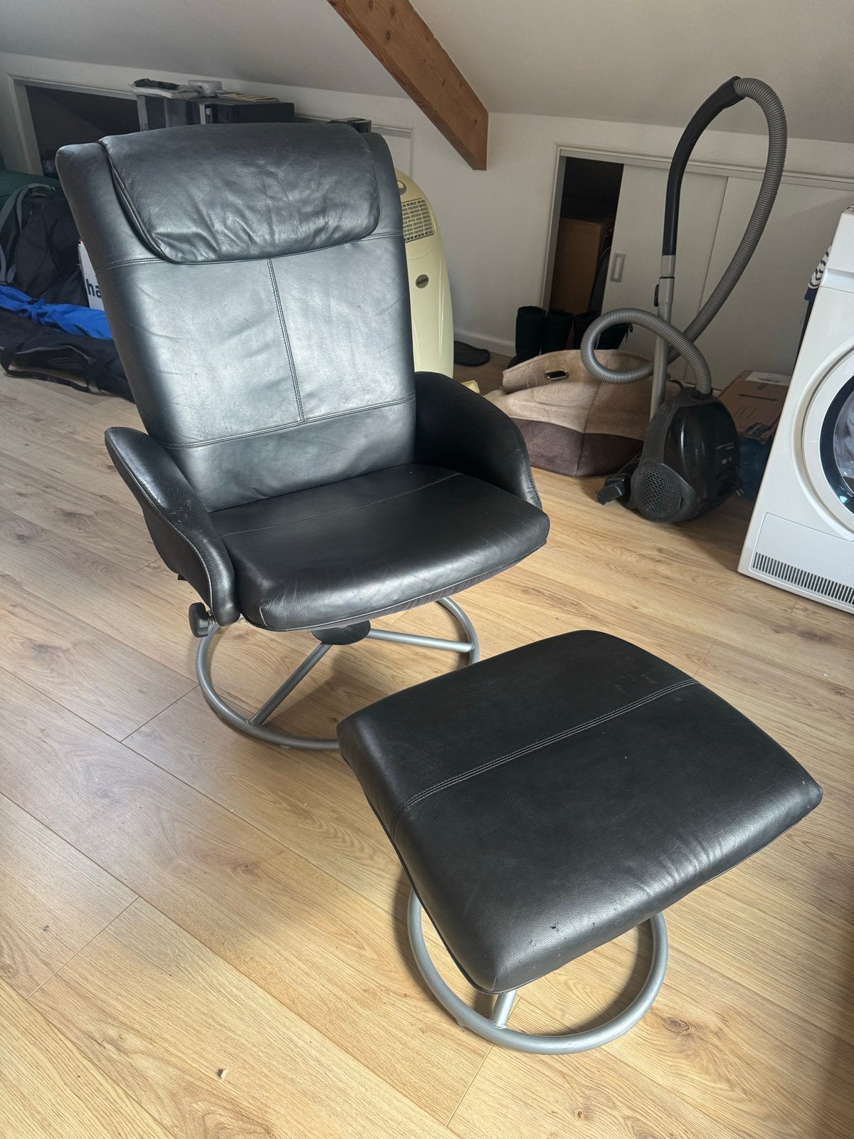 Zwarte (kunst)leren relaxfauteuil met voetenbank