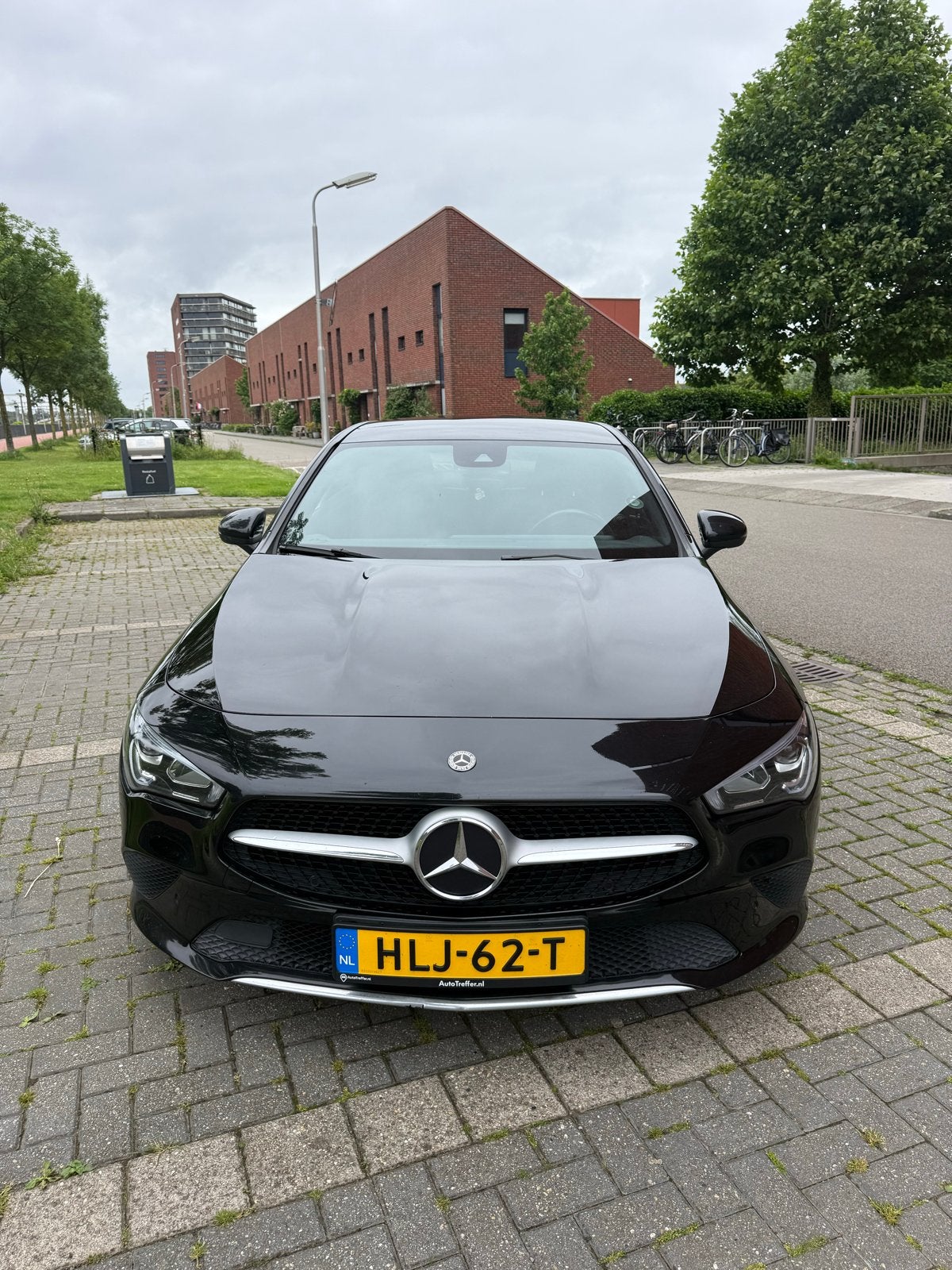 Mercedes-Benz CLA 180 CDI AMG Line 116pk 7G-DCT 2019 Zwart, Auto's, Mercedes-Benz, Parkeerassistent, Zwart, 4 cilinders, Leder en Stof