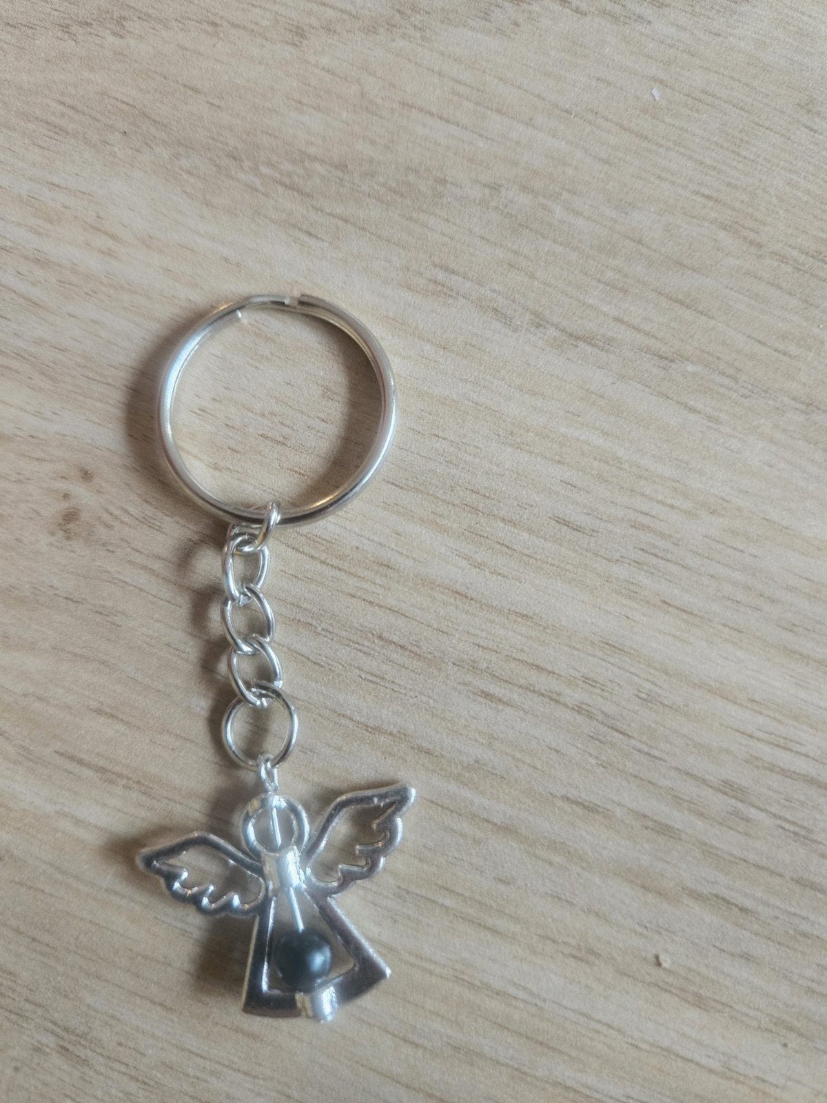 Sleutelhanger met engel en zwarte kraal, Verzamelen, Ophalen of Verzenden, Zo goed als nieuw, Overige typen