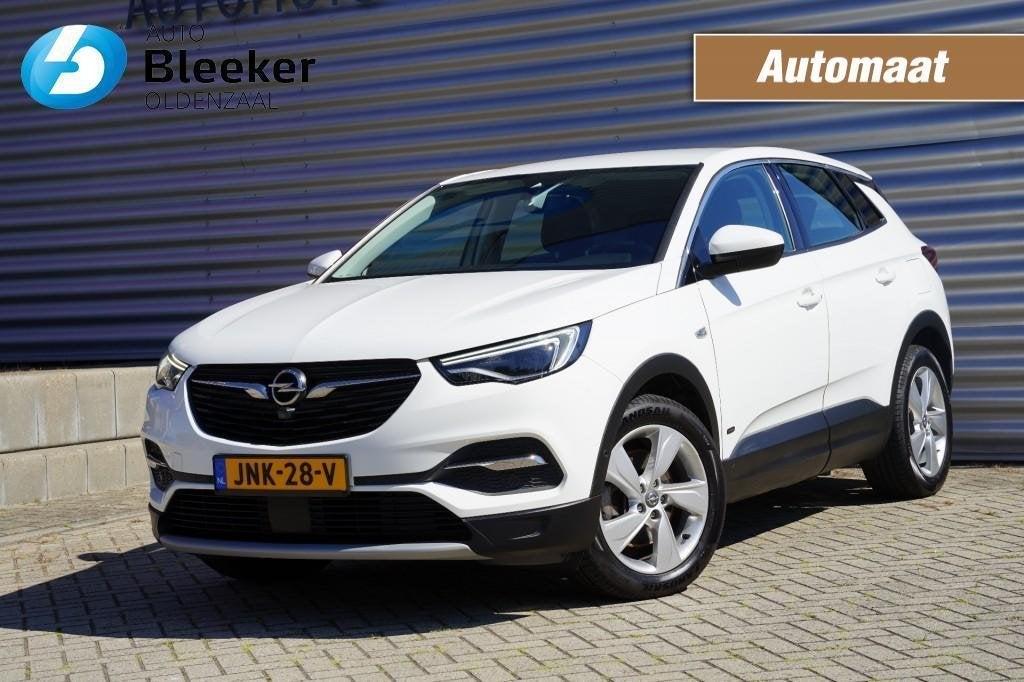 Opel Grandland X 1.6T Hybr. 228PK Elegance Ecc Cruise BT Car, Auto's, 228 pk, 4 cilinders, Leder en Stof, Wit