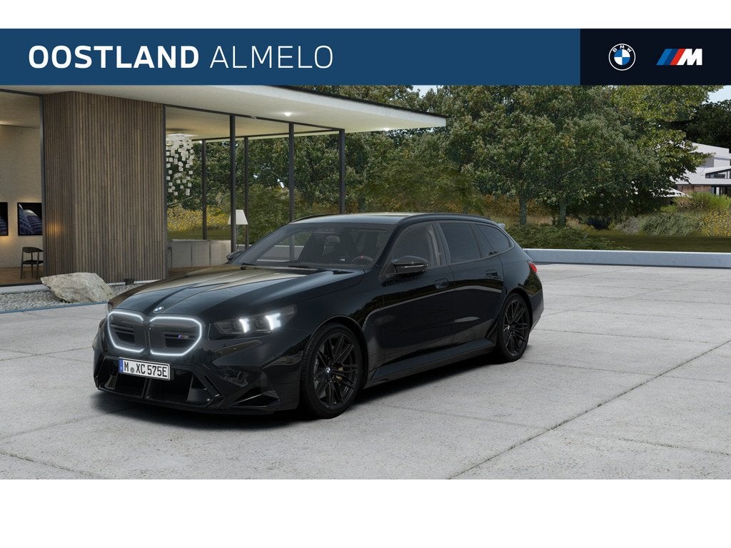 BMW 5 Serie Touring M5 Automaat / M Drive Professional / Bow, Auto's, BMW, 4395 cc, Zwart, Leder, Hybride Elektrisch/Benzine