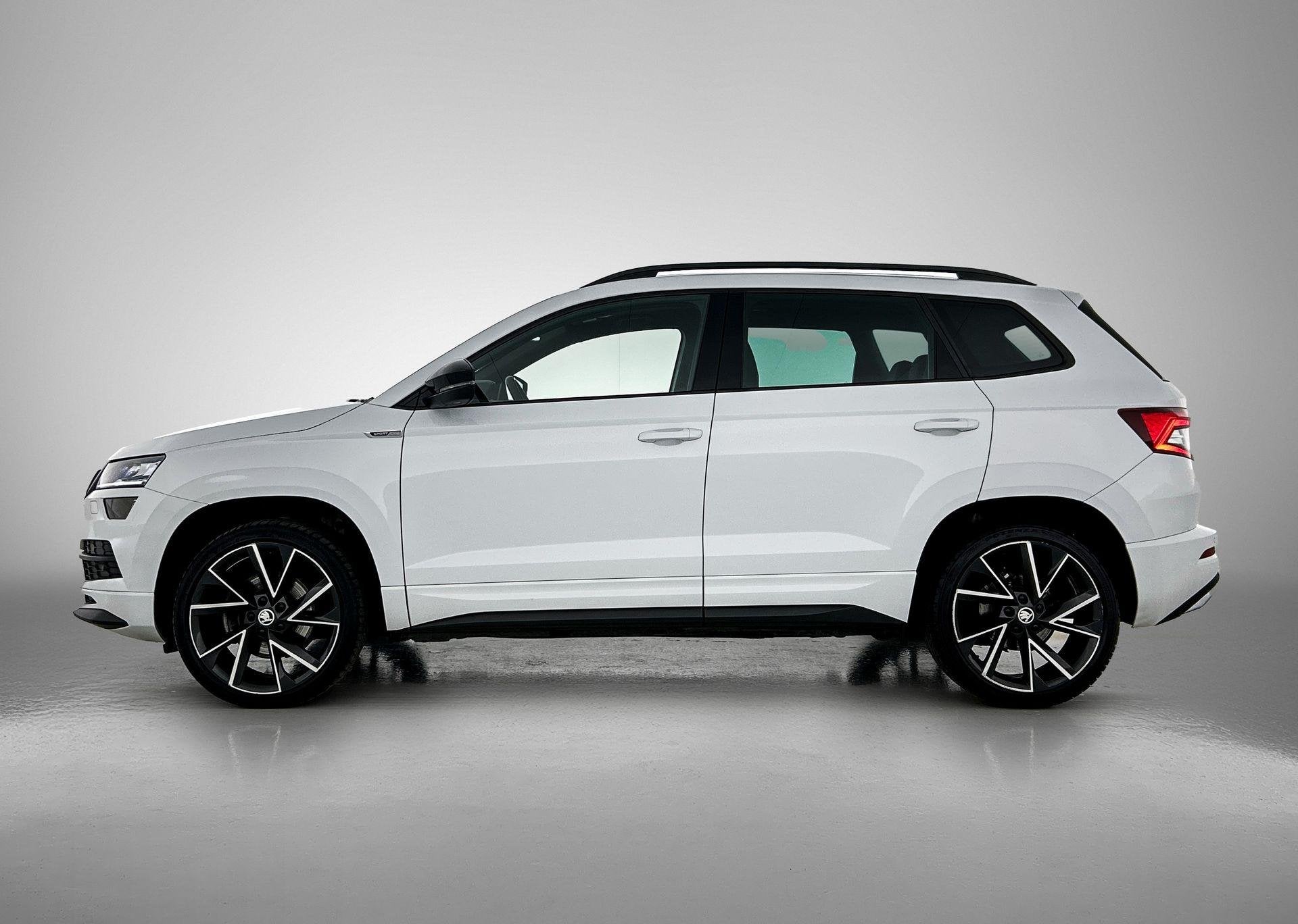 Skoda Karoq 1.5 TSI ACT Sportline Business | PANORAMADAK | S, 12 maanden, Stof, 4 cilinders, Wit