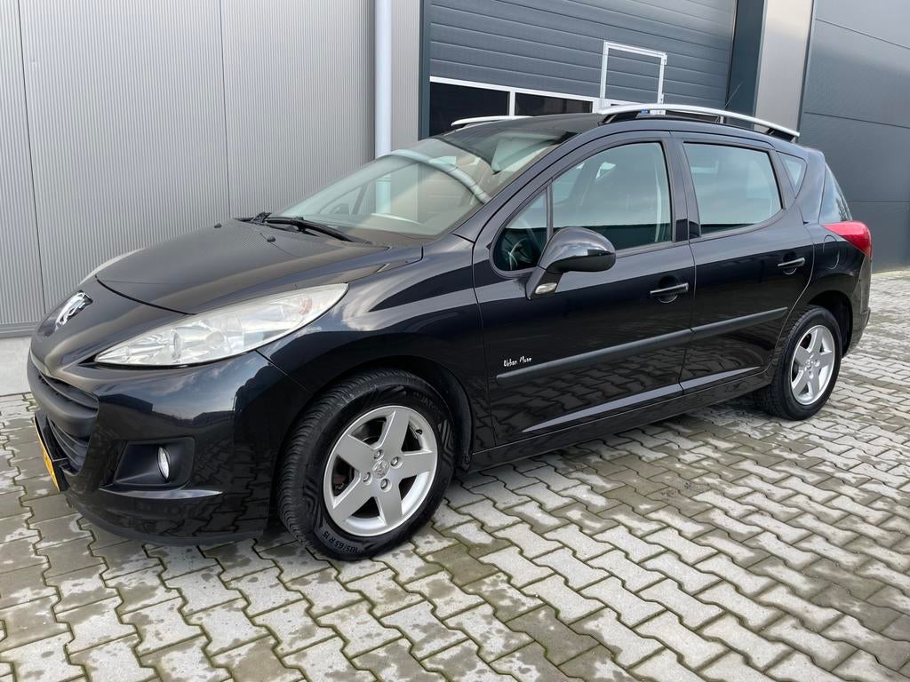 Peugeot 207 1.4 95pk X-line 2010 Zwart NW APK, Voorwielaandrijving, Stof, Zwart, Handgeschakeld