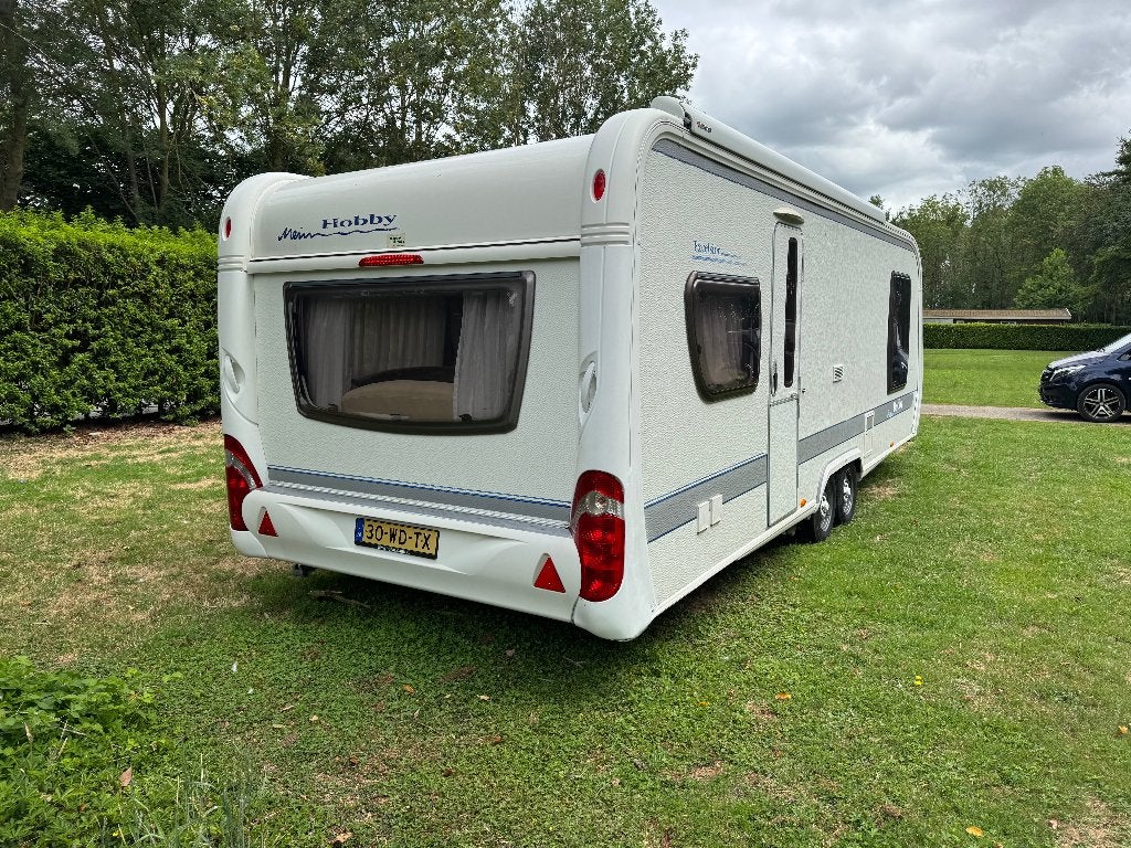 Te koop Hobby toercaravan excelsior tandemasser, Caravans en Kamperen, Hobby, 7 tot 8 meter, Bedrijf, Schokbreker