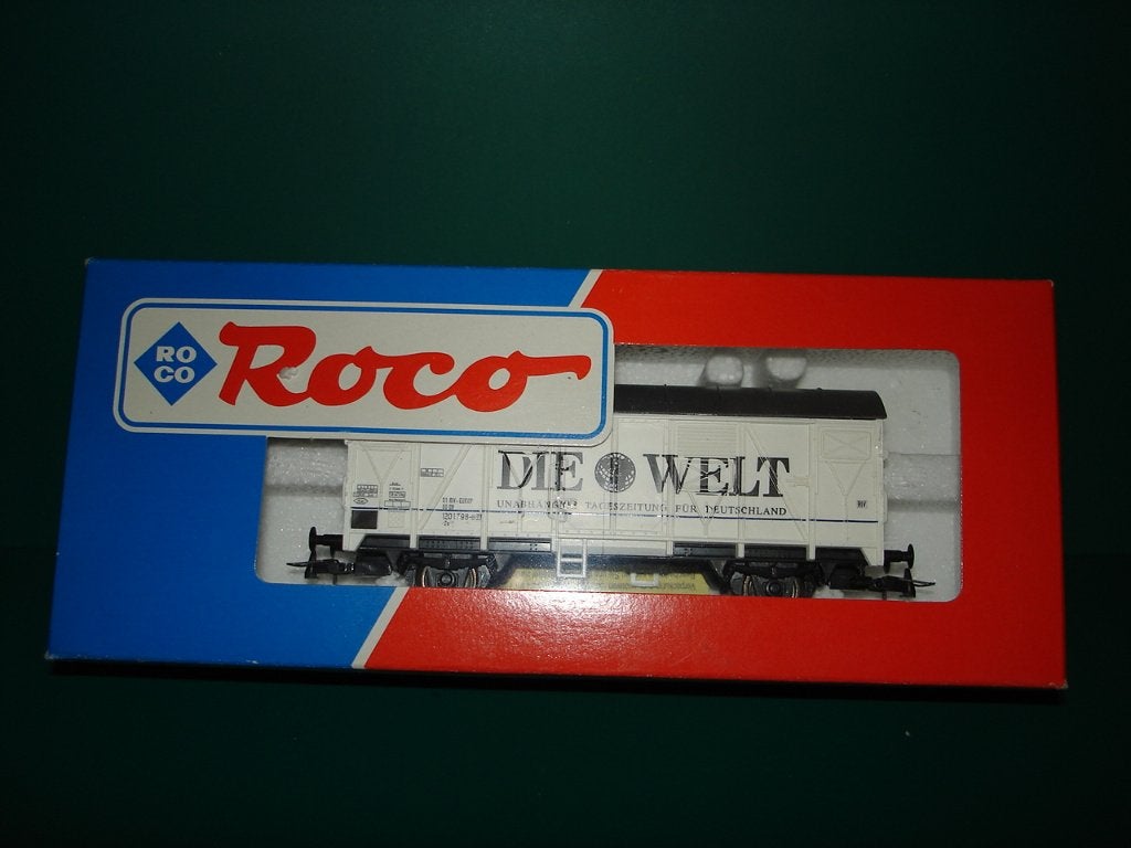 ROCO goederen wagon DB "Die Welt" NIEUW, Gelijkstroom, Ophalen of Verzenden, Roco, Nieuw