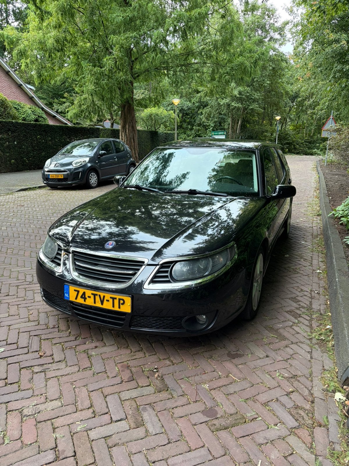 Saab 9-5 2.0 T Sport Estate AUT 2007 Zwart, Auto's, 1800 kg, 4 cilinders, Zwart, Origineel Nederlands