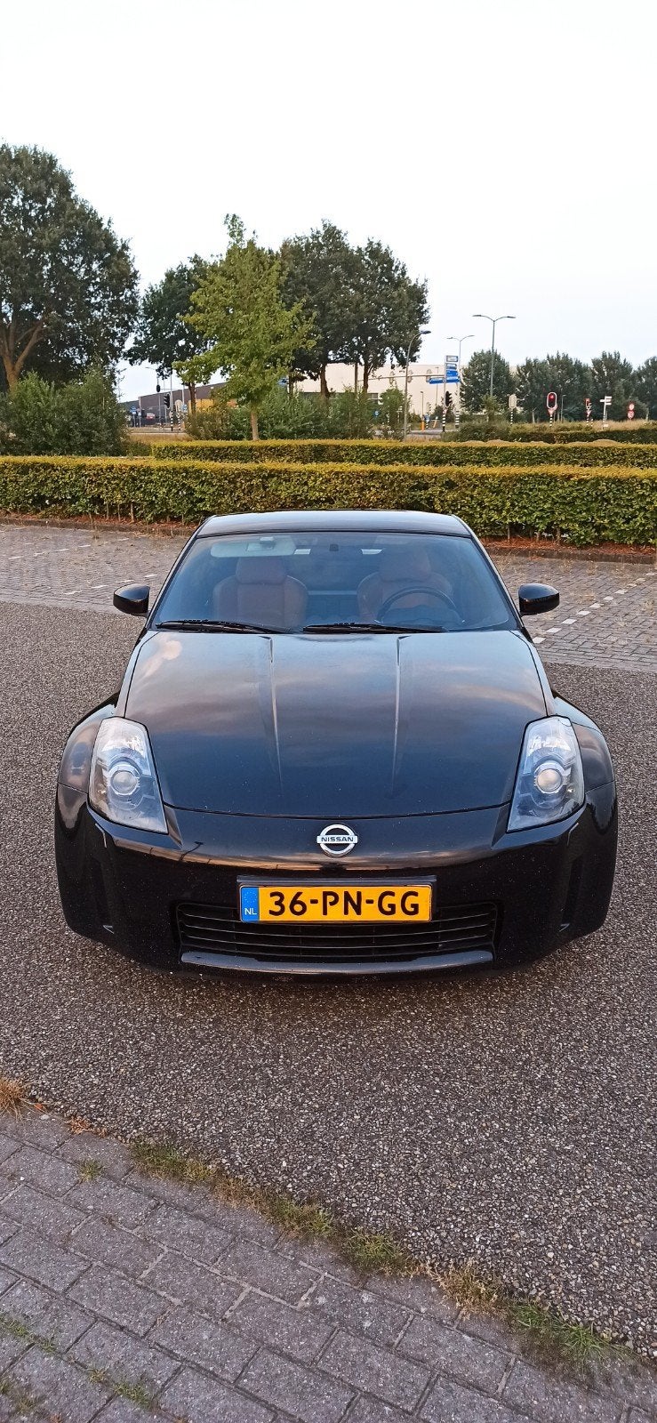 Nissan 350Z 3.5 V6 2004 Zwart APK tot 23-06-2027, Auto's, 350Z, Achterwielaandrijving, Zwart, Origineel Nederlands