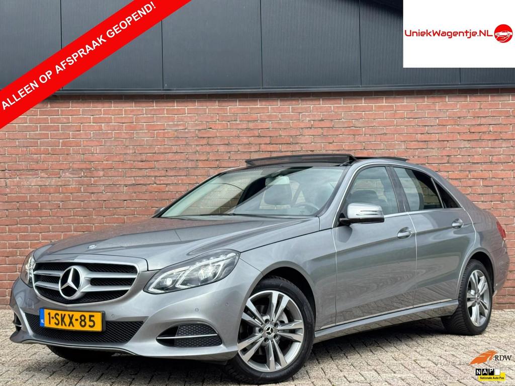 Mercedes-Benz E-Klasse 200 | NL-AUTO! | DEALER OH! | LEDER!, Auto's, Automaat, Achterwielaandrijving, Gebruikt, 4 cilinders