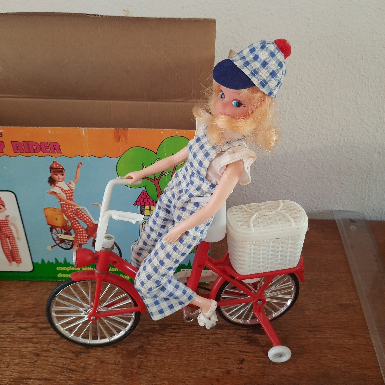 Randy Rider Sixties meisje op rode fiets KWADRAAT, Ophalen of Verzenden