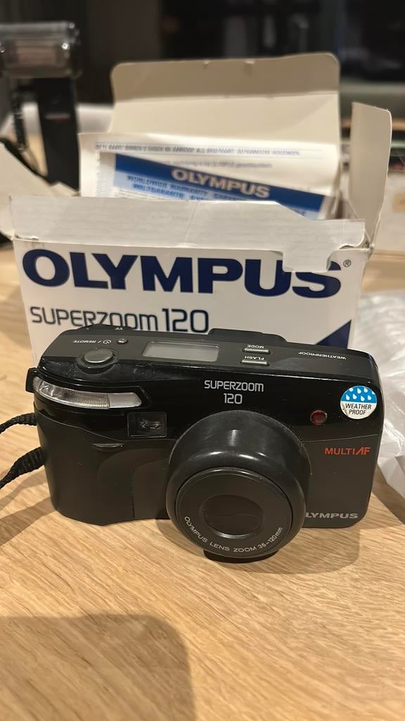 Olympus 120 - zgan in doos - nochris 2.0 st anna, Ophalen of Verzenden, Zo goed als nieuw, Spiegelreflex, Olympus