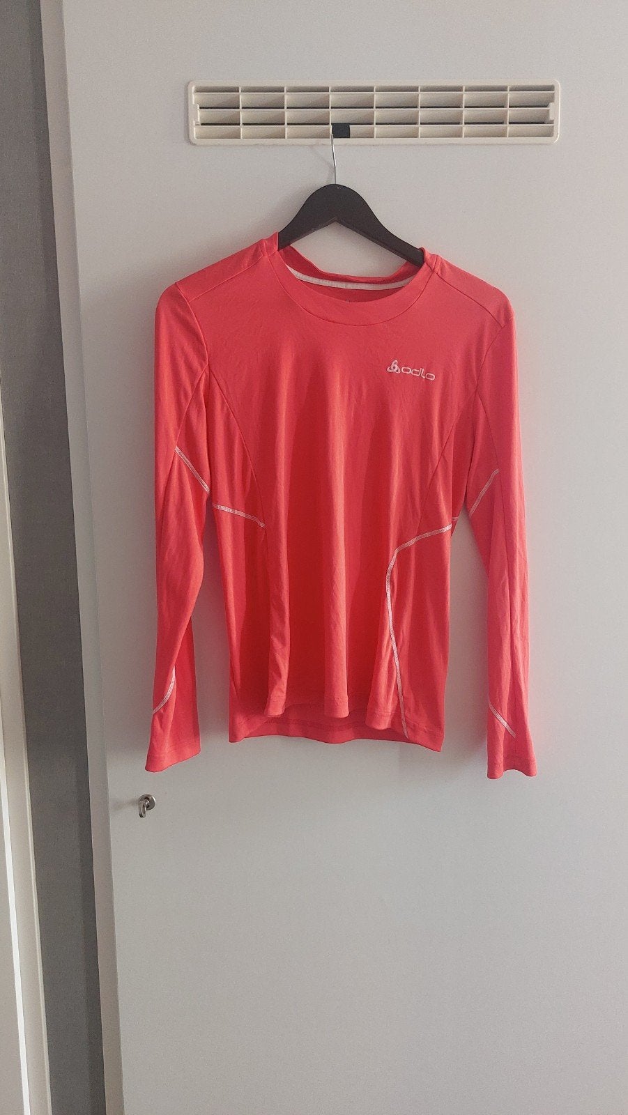 Odlo sportshirt lange mouwen oranje maat 36, Maat 38/40 (M), Oranje, Ophalen of Verzenden, Zo goed als nieuw